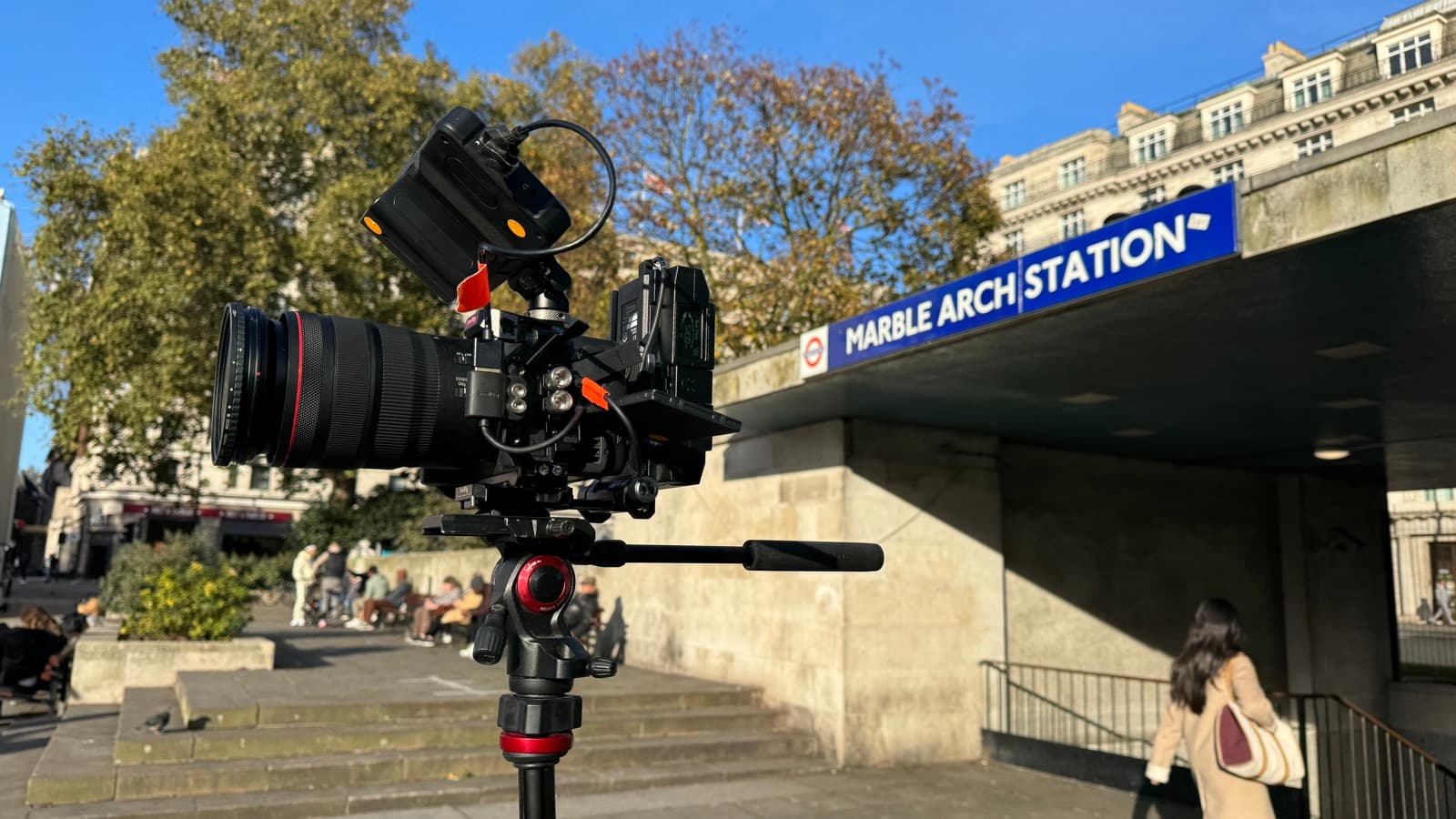 A camera rigged on sticks outside Marble Arch station on a clear autumn morning